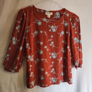 Monteau blouse rusty red with blue flowers M